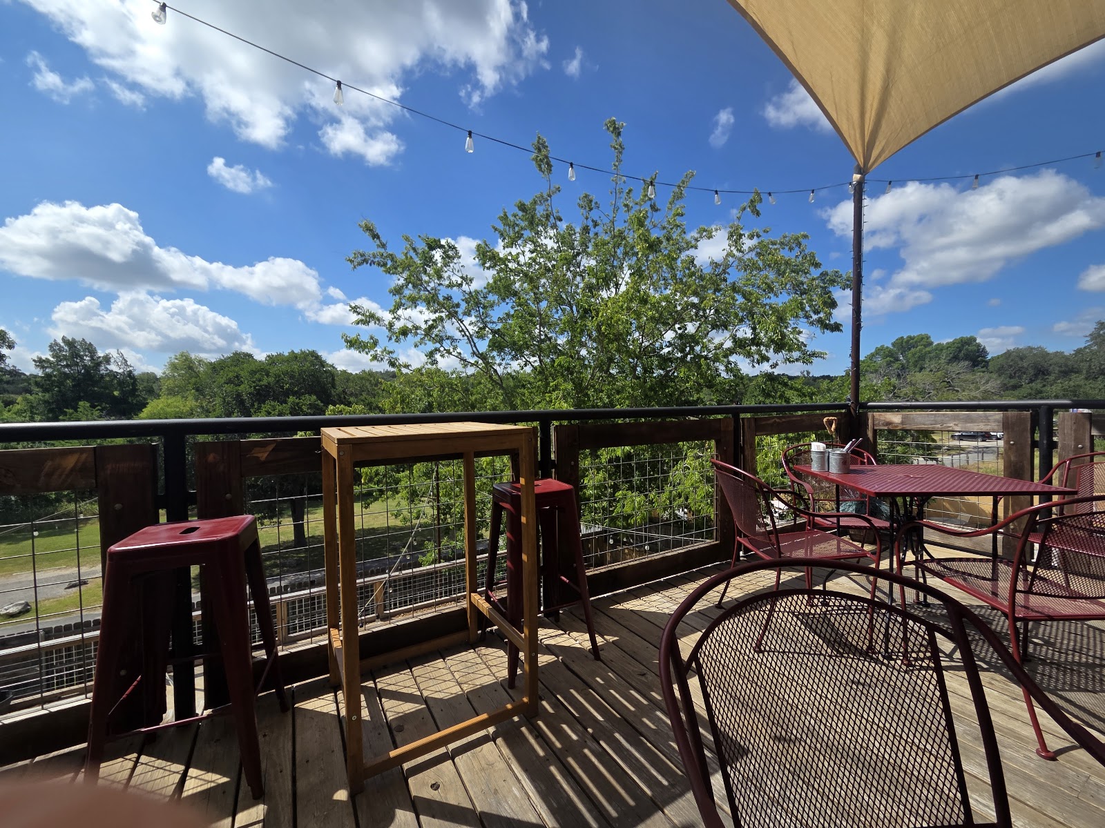 The Bistro at Blanco River exterior and river view